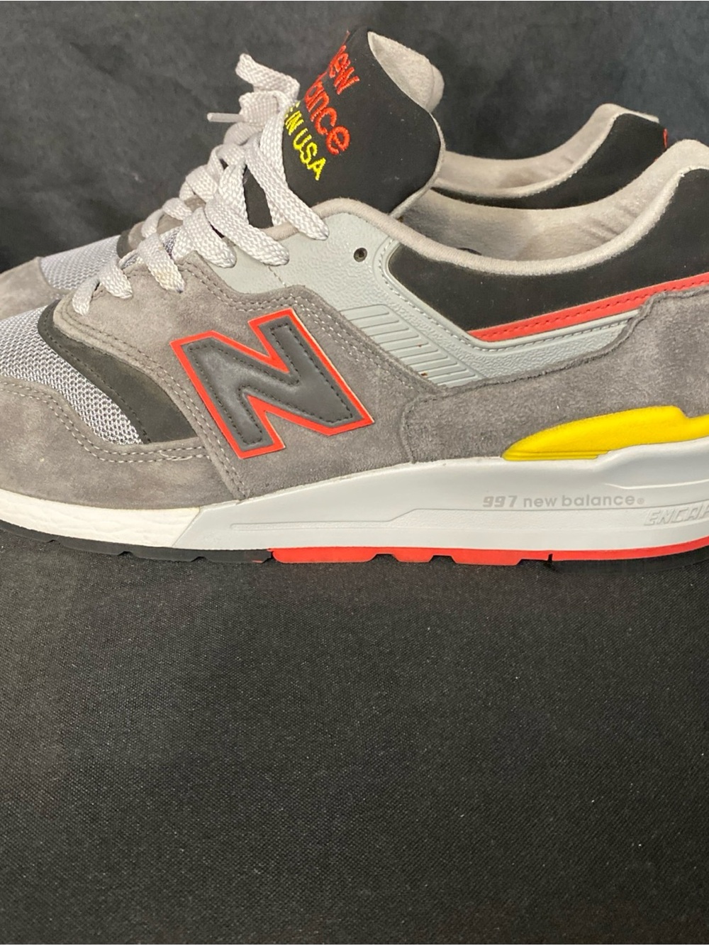 New Balance Men’s Grey Suede Sneakers with Red & Yellow Accents